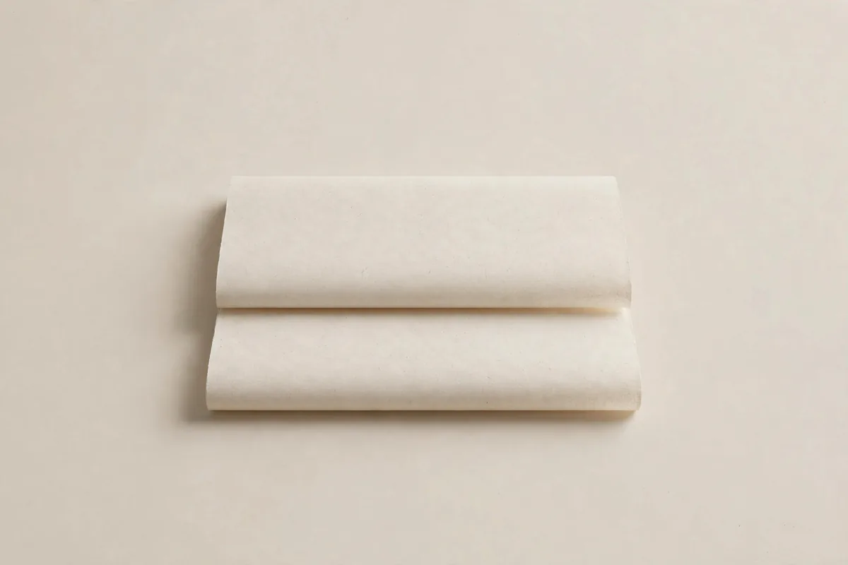 A folded sheet of drafting paper